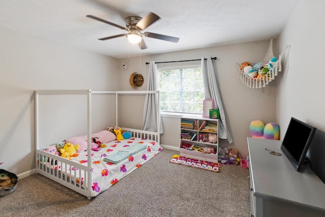 bedroom with ceiling fan and carpet