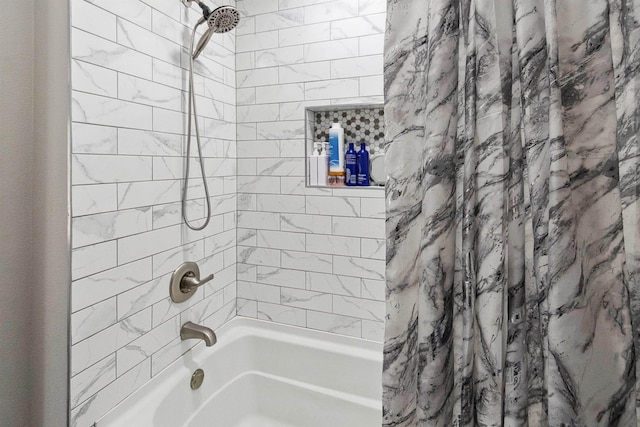 bathroom featuring shower / bath combination with curtain