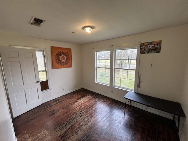 interior space with dark wood-type flooring