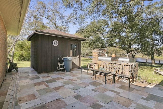 view of patio featuring an outdoor structure