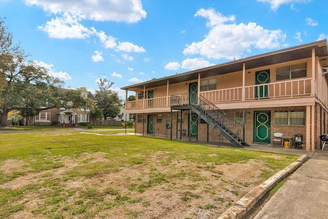 2210 N St, Beaumont, TX 77701 - back of house with a yard