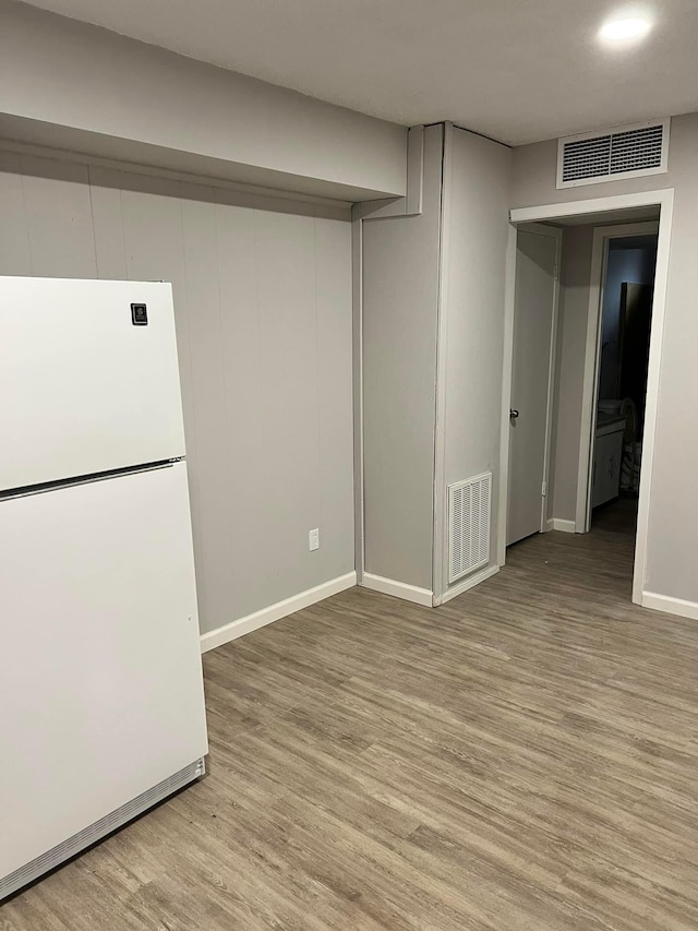 2210 N St, Beaumont, TX 77701 - unfurnished room with light wood-type flooring