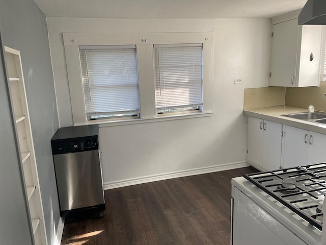 kitchen featuring white stove, white cabinets, sink, stainless steel dishwasher, and dark hardwood / wood-style flooring