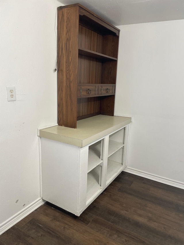 mudroom with dark wood-type flooring