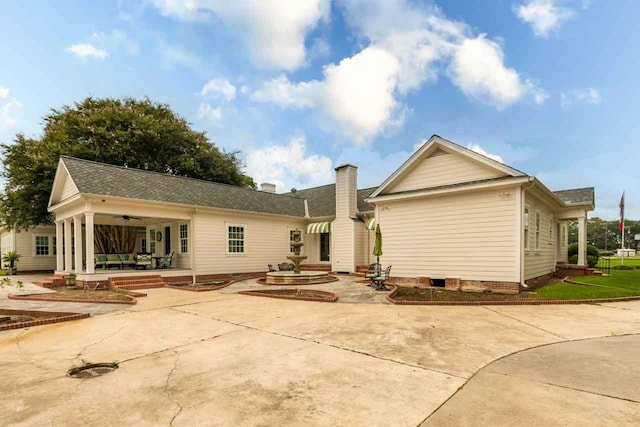 rear view of house with a patio area