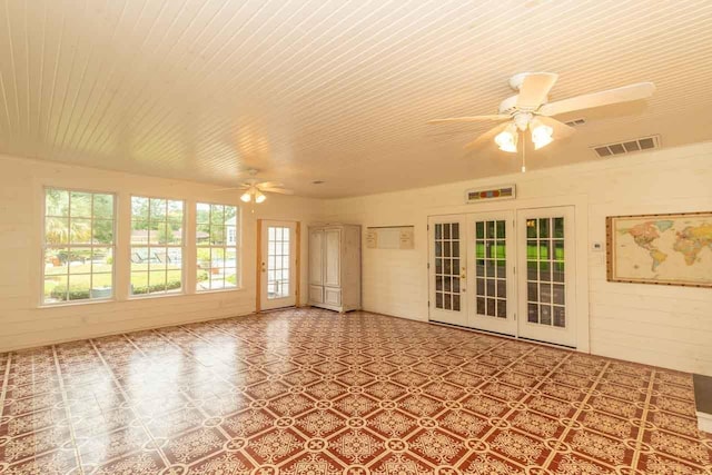 interior space featuring ceiling fan