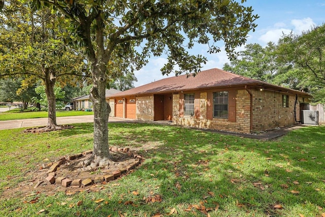 5960 Navajo Trl, Beaumont, TX 77708 - ranch-style home with concrete driveway, brick siding, an attached garage, and central AC