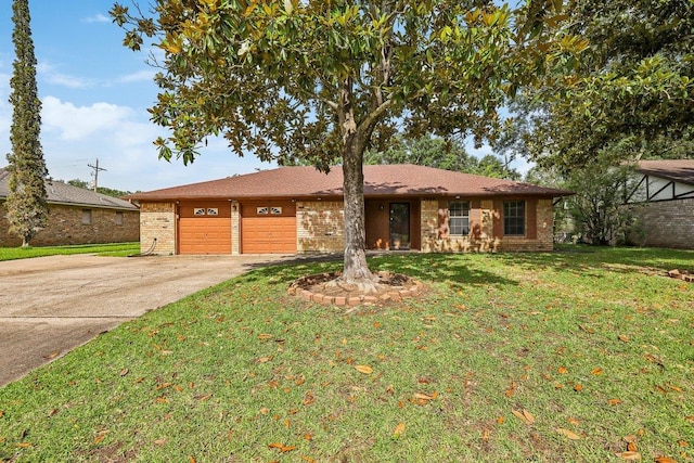 5960 Navajo Trl, Beaumont, TX 77708 - ranch-style home featuring concrete driveway, a garage, brick siding, and a front yard