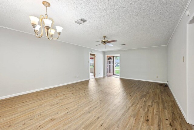 5960 Navajo Trl, Beaumont, TX 77708 - unfurnished room featuring a textured ceiling, a chandelier, light wood finished floors, a ceiling fan, and baseboards