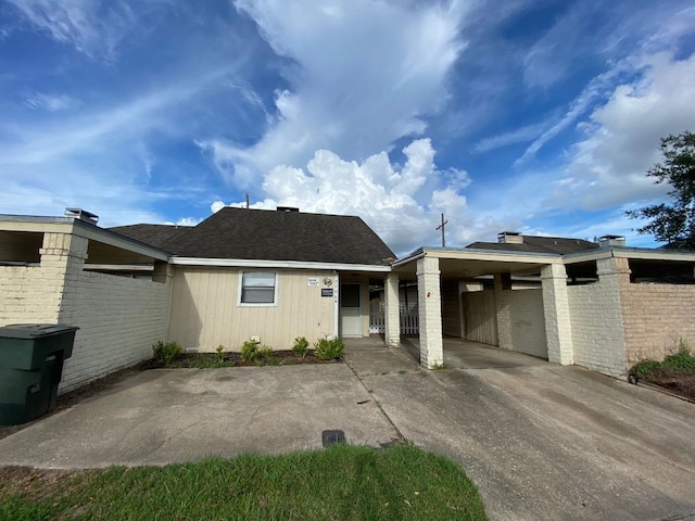 view of front of house with a carport