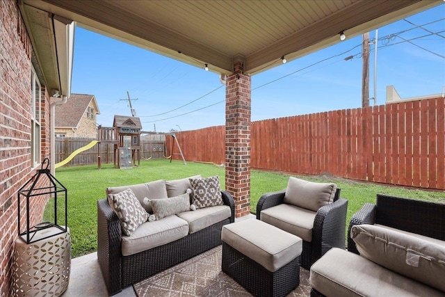 3113 Labrador Ln, Port Neches, TX 77651 - view of patio / terrace featuring a fenced backyard, a playground, and an outdoor hangout area