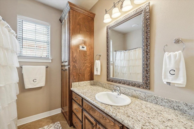 3113 Labrador Ln, Port Neches, TX 77651 - full bath featuring baseboards, tile patterned flooring, and vanity