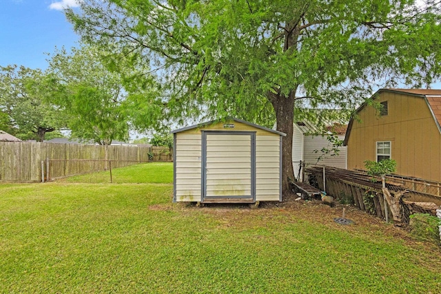 view of shed featuring a fenced backyard