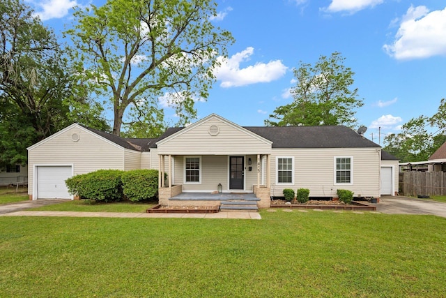ranch-style house with roof with shingles, a front lawn, driveway, a porch, and fence