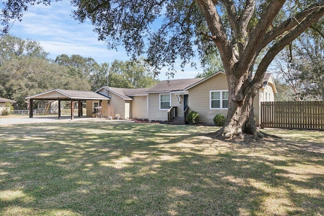 single story home with a front yard and a carport