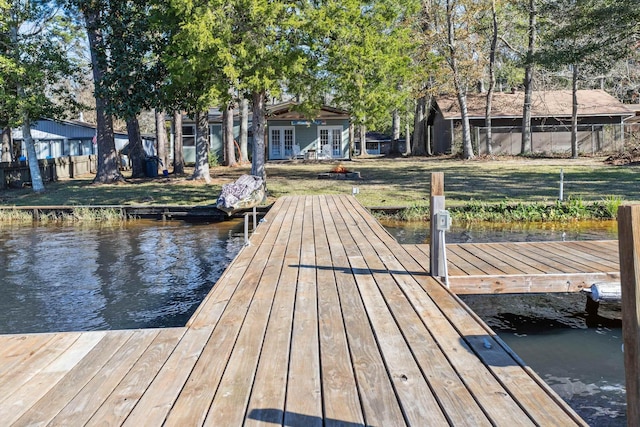 view of dock with a water view