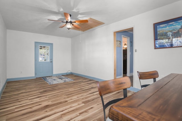 foyer featuring ceiling fan and light hardwood / wood-style flooring