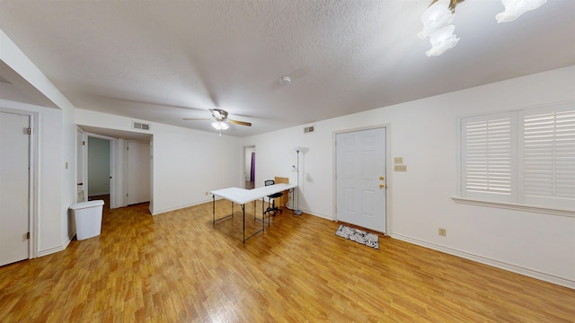 1005 Black Walnut Ln, Jasper, TX 75951 - interior space featuring baseboards, ceiling fan, light wood-style flooring, and visible vents