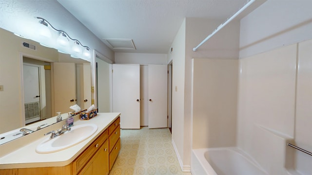 1005 Black Walnut Ln, Jasper, TX 75951 - full bath with visible vents, baseboards, tile patterned floors, and vanity