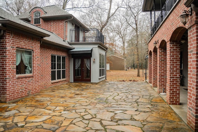 view of patio / terrace featuring a balcony