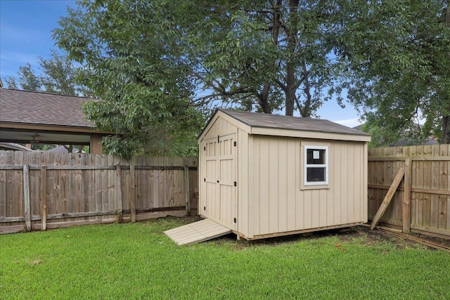 5955 Bicentennial Ln, Beaumont, TX 77706 - view of shed with a fenced backyard