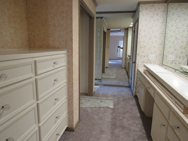 bathroom featuring wallpapered walls