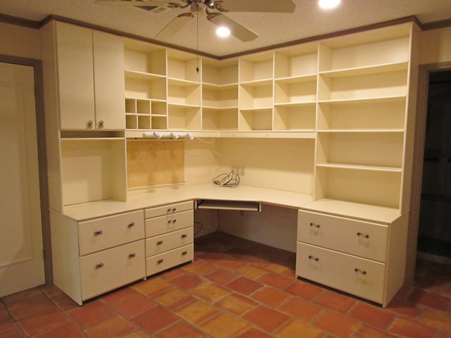 unfurnished office featuring recessed lighting, a ceiling fan, and built in study area