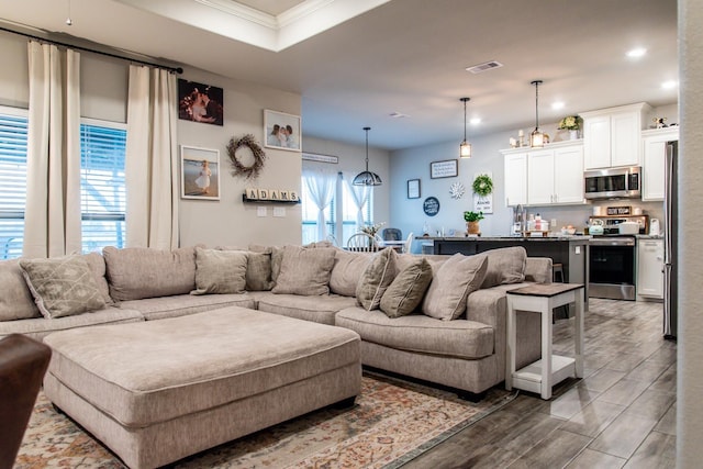 living room featuring ornamental molding