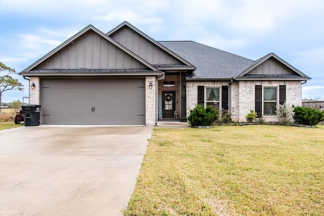 craftsman-style house with a front lawn and a garage