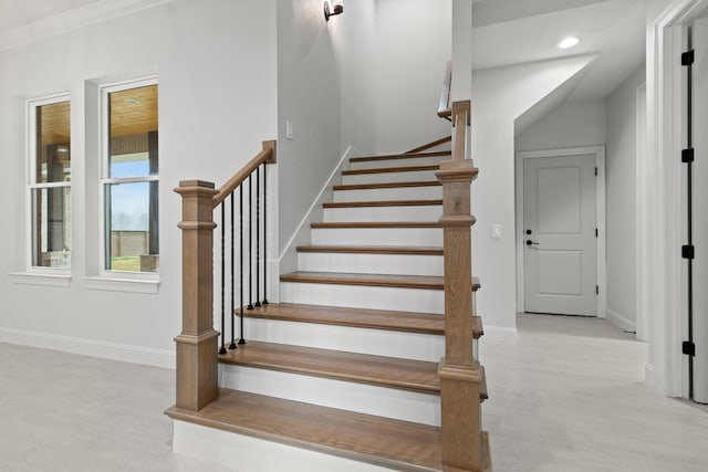 stairs featuring recessed lighting, wood finished floors, and baseboards