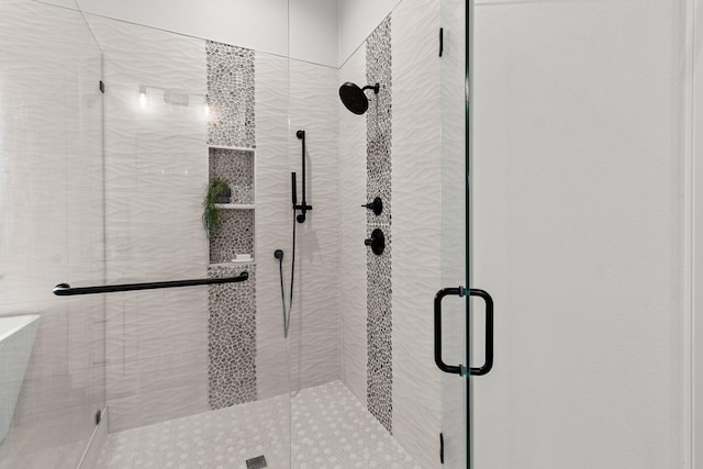 full bathroom with a shower stall