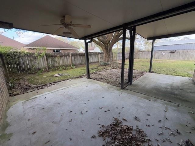 view of patio / terrace with a fenced backyard and ceiling fan