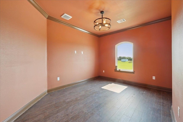 3730 Loblolly Trl, Beaumont, TX 77713 - empty room featuring ornamental molding, dark wood-style floors, baseboards, and a chandelier