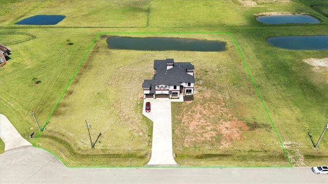 3730 Loblolly Trl, Beaumont, TX 77713 - view of front of home with stucco siding, concrete driveway, a garage, and a shingled roof