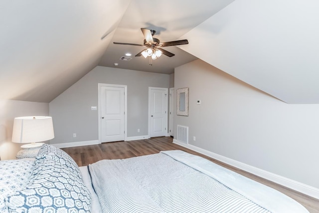 4813 Augusta Dr, Groves, TX 77619 - bedroom featuring wood finished floors, lofted ceiling, and a ceiling fan