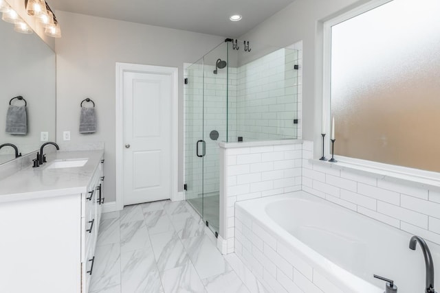 4813 Augusta Dr, Groves, TX 77619 - bathroom featuring vanity, a garden tub, a stall shower, marble look tile flooring, and recessed lighting