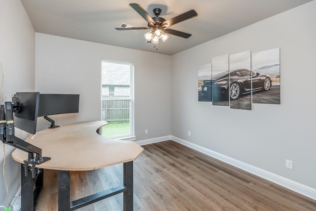 4813 Augusta Dr, Groves, TX 77619 - office featuring wood finished floors and a ceiling fan