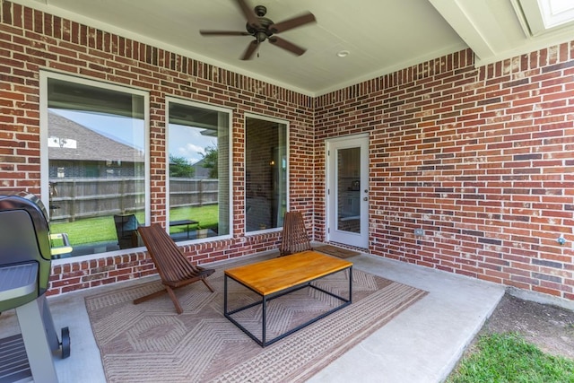 4813 Augusta Dr, Groves, TX 77619 - view of patio featuring ceiling fan