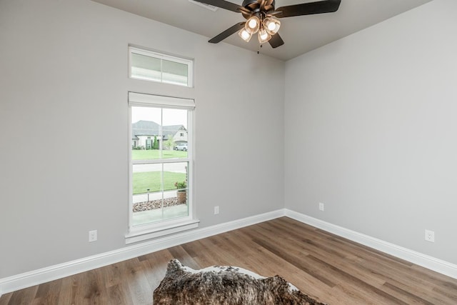 4813 Augusta Dr, Groves, TX 77619 - unfurnished room featuring wood finished floors and a ceiling fan