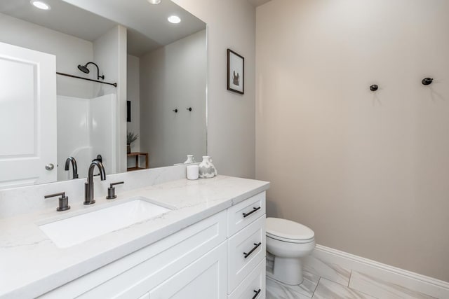 4813 Augusta Dr, Groves, TX 77619 - bathroom with vanity, marble look tile flooring, recessed lighting, and a shower