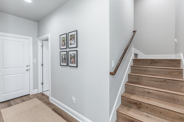 4813 Augusta Dr, Groves, TX 77619 - foyer entrance featuring wood finished floors, stairs, and recessed lighting
