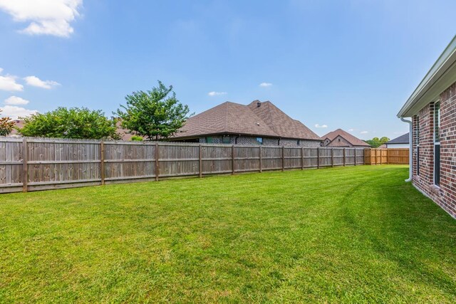 4813 Augusta Dr, Groves, TX 77619 - view of fenced backyard