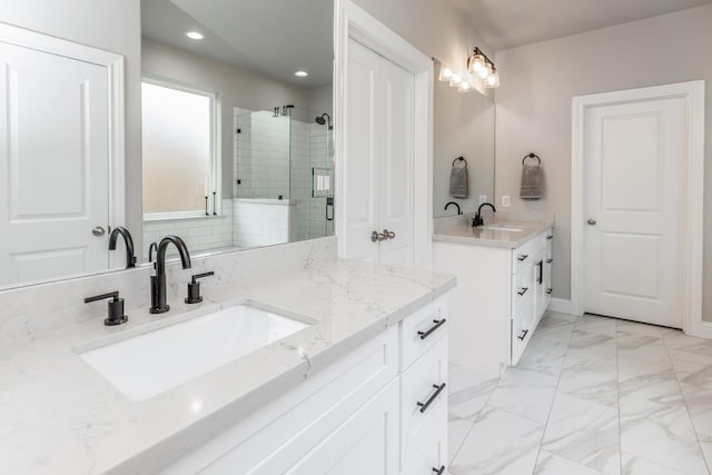 4813 Augusta Dr, Groves, TX 77619 - full bathroom featuring two vanities, a stall shower, and recessed lighting