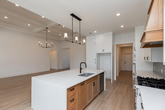 3580 Lily Ln, Beaumont, TX 77713 - kitchen with custom range hood, dishwasher, a sink, light wood finished floors, and recessed lighting