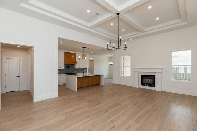 3580 Lily Ln, Beaumont, TX 77713 - kitchen with open floor plan, a chandelier, light countertops, recessed lighting, and healthy amount of natural light