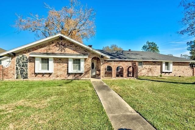 ranch-style home with a front yard