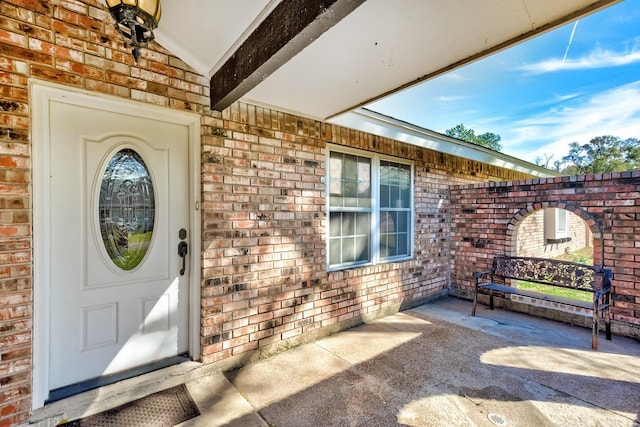 845 Flicker St, Bridge City, TX 77611 - entrance to property with brick siding and a porch