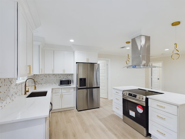 kitchen featuring appliances with stainless steel finishes, island range hood, sink, white cabinets, and backsplash