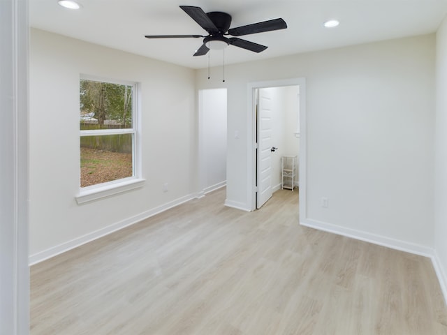 unfurnished bedroom featuring ceiling fan and light hardwood / wood-style floors