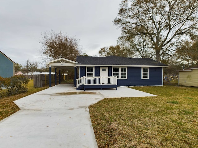 single story home with a carport and a front lawn